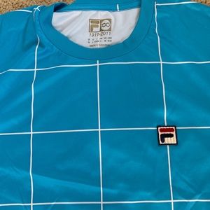 Coral blue Fila Tennis polo shirt size Medium.